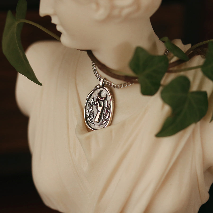 Goddess Selene inspired wax seal hand, olive leaf and crescent moon necklace.